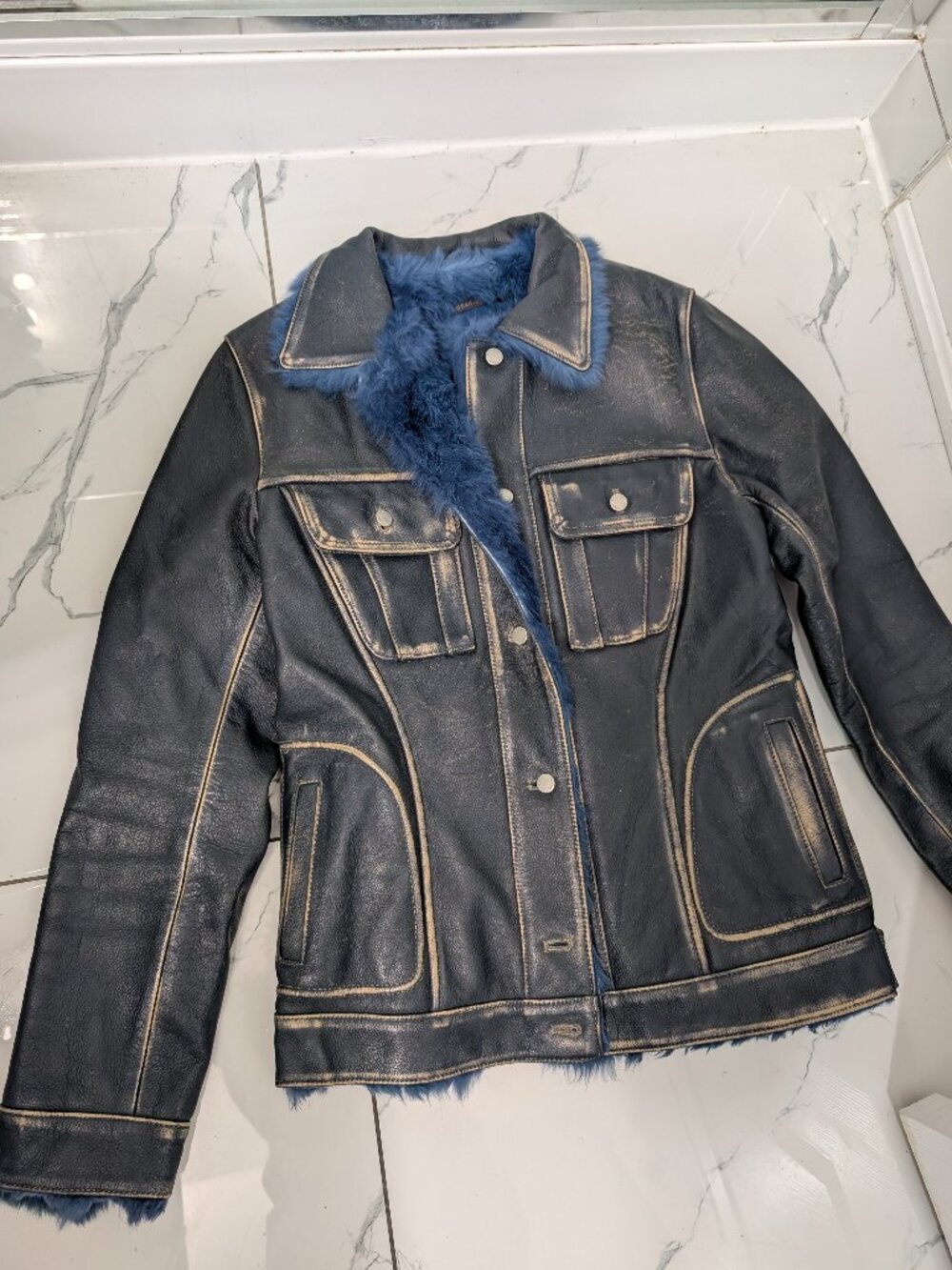 unique and trendy , "distressed look"  blue , fur lined  leather jacket